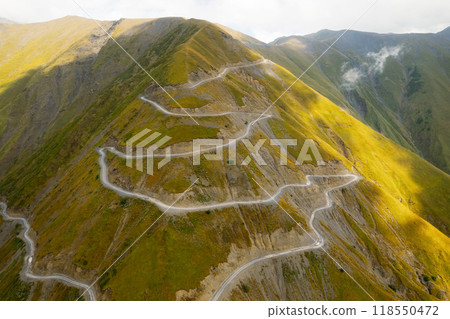 Mountain winding road in Tusheti in Georgia 118550472