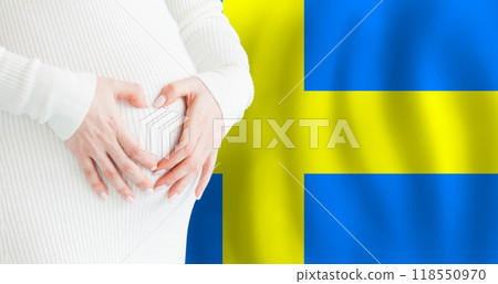 Demographics, pregnancy and love baby in Sweden concept. Pregnant woman making heart  118550970