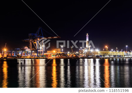 View of Lanterna (lighthouse) in the old port of the city of Genoa at night, Italy View of Lanterna (lighthouse) in the old port of the city of Genoa at night, Italy 118551596