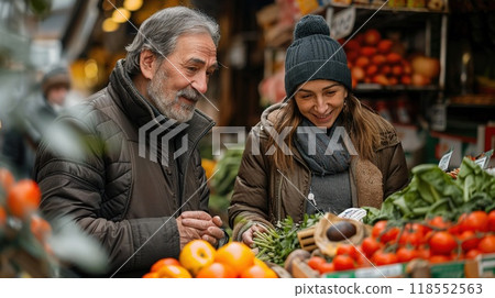 A person helping an elderly neighbor with groceries. 118552563