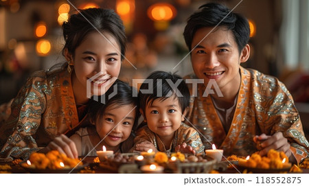 A family celebrating a religious holiday. A family celebrating a religious holiday. 118552875