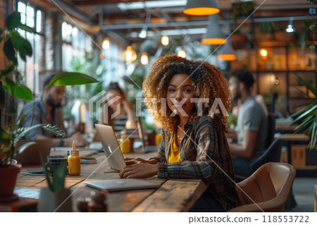 A diverse group of professionals working in a modern office. 118553722