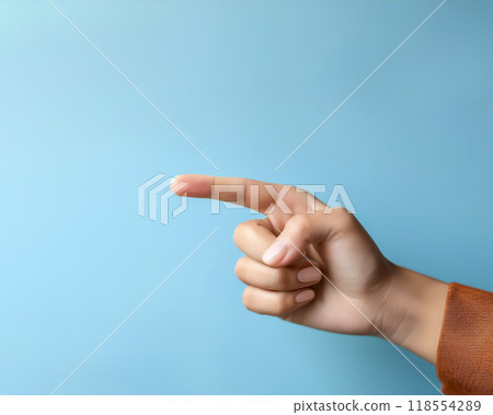 Image of a woman's hand pointing to the side 118554289