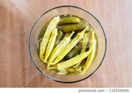top view of pickled cucumber and okra in bowl 118556098