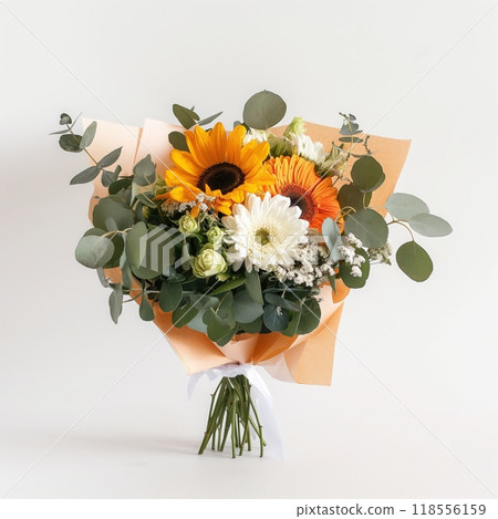 Vibrant bouquet of sunflowers, daisies, orange gerberas, and eucalyptus wrapped in paper, standing Vibrant bouquet of sunflowers, daisies, orange gerberas, and eucalyptus wrapped in paper, standing 118556159