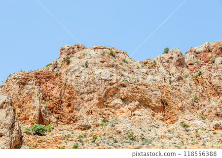 orange wall of gorge around Noravank monastery 118556388