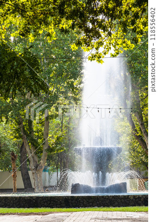 sunlit water fountain in English Park, Yerevan 118556402