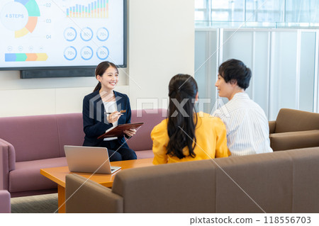 Young woman at the reception desk. Photo courtesy of Denpa Gakuen, Tokyo Electronics College. 118556703