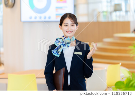 Young woman at the reception desk. Photo courtesy of Denpa Gakuen, Tokyo Electronics College. Young woman at the reception desk. Photo courtesy of Denpa Gakuen, Tokyo Electronics College. 118556713