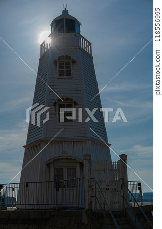 A photo of the old Sakai Lighthouse against the blue sky in Sakai Ward, Sakai City, Osaka Prefecture 118556995