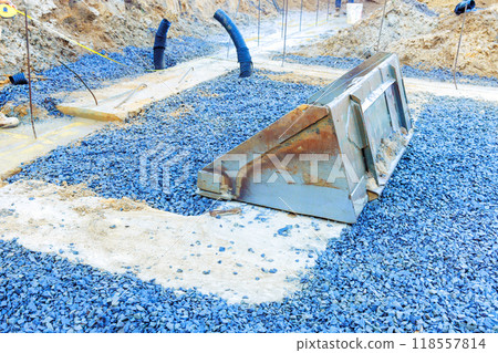 Preparation ground foundations installation formwork for pouring of concrete at a construction site for building Preparation ground foundations installation formwork for pouring of concrete at a construction site for building 118557814