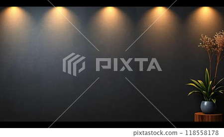 The image is of a dark textured wall with five spotlights highlighting the wall. A green plant in a blue pot is placed on a circular wooden platform in the right side corner of the image. 118558178