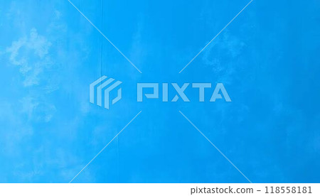 The image is a solid blue color with some faint white 118558181