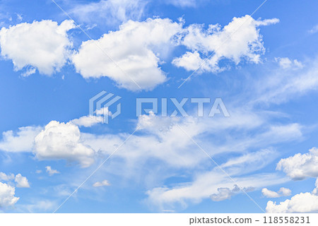 White clouds in a bright blue sky. The beauty of the nature White clouds in a bright blue sky. The beauty of the nature 118558231