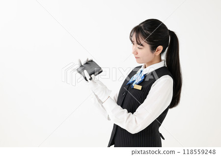 A woman assessing purchase price 118559248