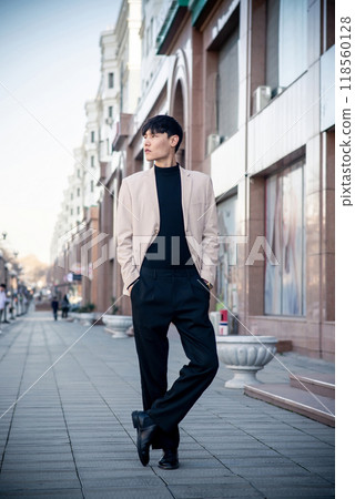 Handsome man in suit, fashion, business, street style. Central Asia 118560128