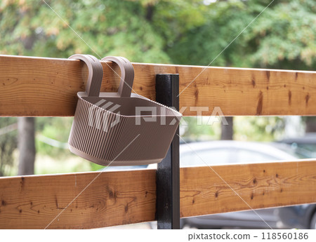 balcony empty flower pot with hanger. High quality photo balcony empty flower pot with hanger. High quality photo 118560186