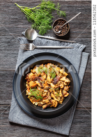 fried blend of wild mushrooms in a bowl 118562302