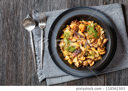 fried blend of wild mushrooms in a bowl fried blend of wild mushrooms in a bowl 118562303