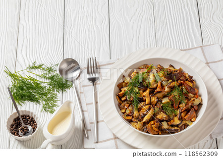 fried blend of wild mushrooms in a bowl 118562309