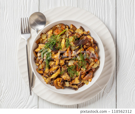 fried blend of wild mushrooms in a bowl 118562312