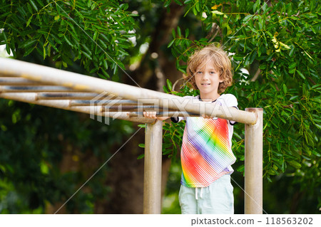 Child on playground. Active kid in school yard. 118563202