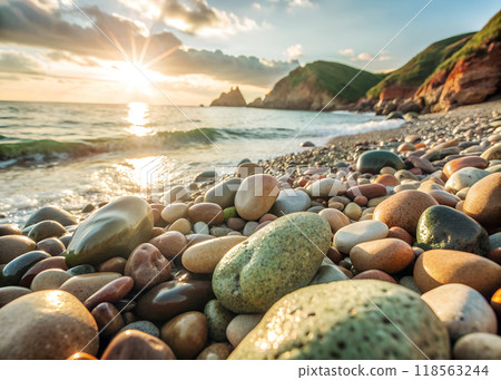 Sunset Over Rocky Beach with Vibrant Sky 118563244