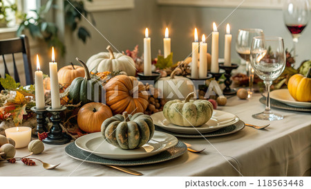 Thanksgiving Table Setting with Pumpkins and Candles - Autumn Thanksgiving Setting  118563448