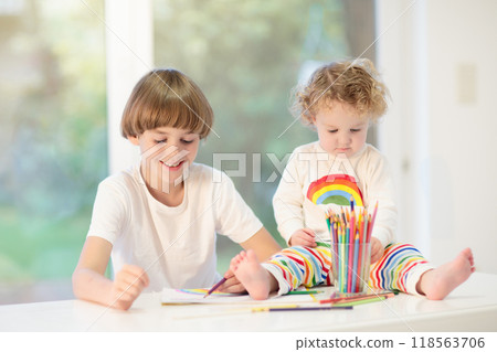 Kids paint. Child painting. Little girl drawing. Kids paint. Child painting. Little girl drawing. 118563706