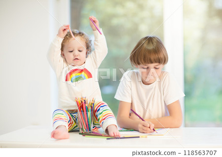 Kids paint. Child painting. Little girl drawing. Kids paint. Child painting. Little girl drawing. 118563707