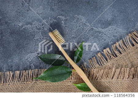 A bamboo toothbrush. Environmentally friendly and waste free. A bamboo toothbrush. Environmentally friendly and waste free. 118564356