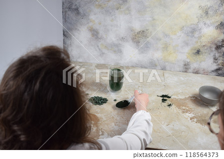 Two young girls photographing in a professional studio 118564373