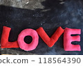 Love, written in red, in the color of love. 118564390