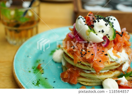 Smoked salmon pancakes with cream Smoked salmon pancakes with cream 118564857