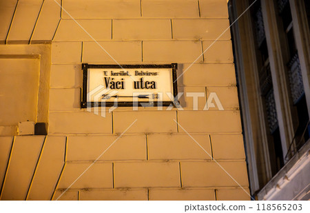 Budapest, Hungary. August 25, 2022. Night shot of the sign of the shopping and strolling street: vaci utca. 118565203