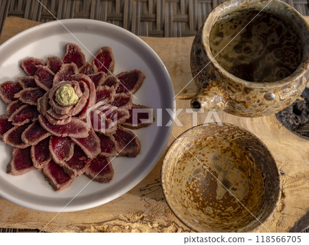 Drinking sake with venison Drinking sake with venison 118566705