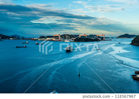 Cruise ship arriving at Nagasaki Port (National Geographic Resolution) from Megami Ohashi Bridge [Nagasaki City] 118567967