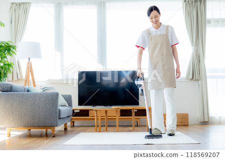 Vacuum cleaner woman Vacuum cleaner woman 118569207