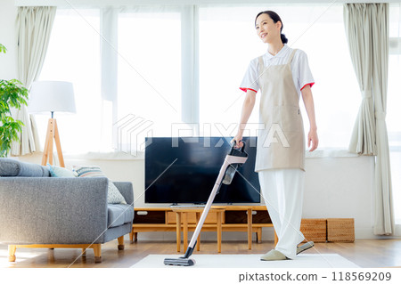 Vacuum cleaner woman Vacuum cleaner woman 118569209