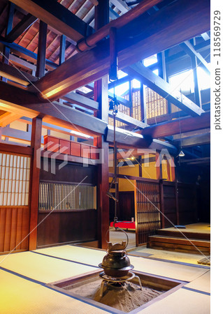 Beams and hearth in the atrium (vertical) 118569729