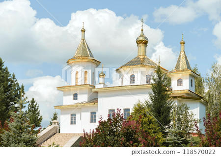 Nestled within the Ufa diocese, the Uspensky Svyato-Georgievsky 'Holy Bushes' male monastery captivates with its onion domes and intricate facades, a revered sanctuary of the Russian Orthodox faith Nestled within the Ufa diocese, the Uspensky Svyato-Georgievsky 'Holy Bushes' male monastery captivates with its onion domes and intricate facades, a revered sanctuary of the Russian Orthodox faith 118570022