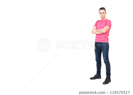 Confident man with folded hands in studio 118570527