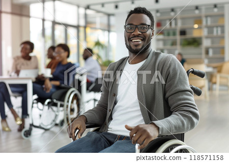 Empowered disabled African American man in wheelchair smiling happily 118571158