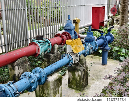 A collection of pipes is interconnected with each other A collection of pipes is interconnected with each other 118573784