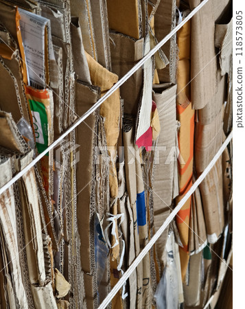 A large pile of cardboard in a big landfill A large pile of cardboard in a big landfill 118573805