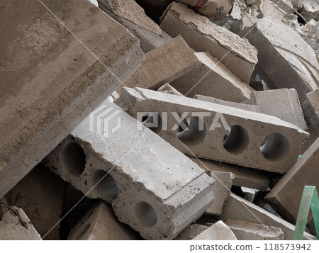 A large stack of concrete slabs on a construction site 118573942