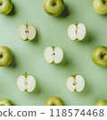 green apples pattern on pastel green background, copy space, apples cut in half, top view 118574468