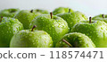 many fresh green apples on light background, macro photography 118574471