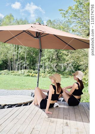 Woman enjoying sauna in the great outdoors 118574798