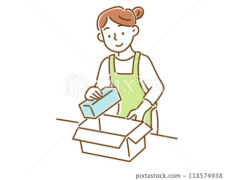 A young woman in an apron putting luggage into a cardboard box A young woman in an apron putting luggage into a cardboard box 118574938